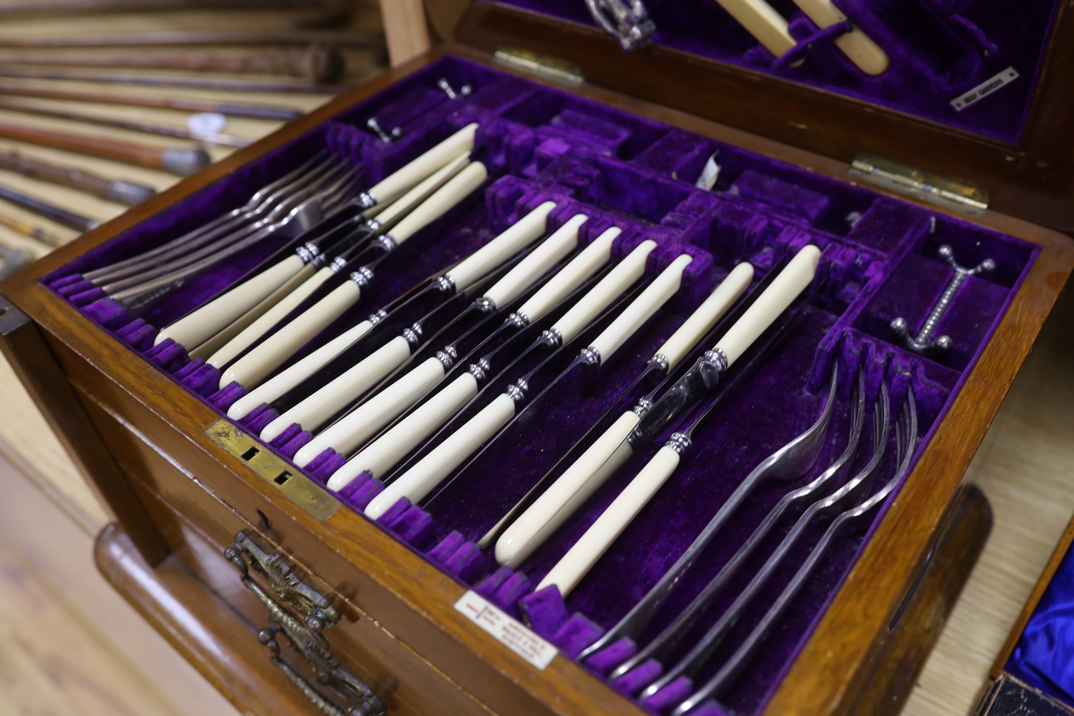 Two oak cased canteens of Old English pattern plated flatware and smaller boxes of cutlery